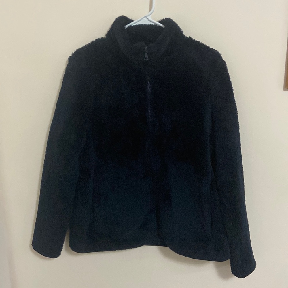 Fuzzy soft Zip up sweater.